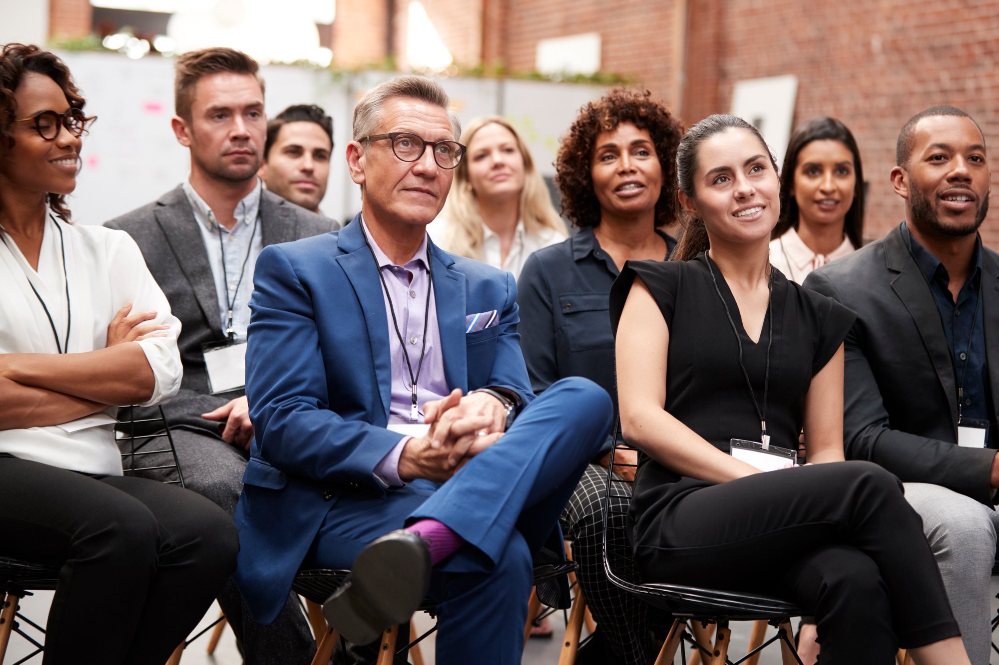 group-of-businessmen-and-businesswomen-listening-t-2024-10-19-02-42-30-utc